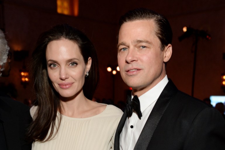 HOLLYWOOD, CA - NOVEMBER 05: Writer-director-producer-actress Angelina Jolie Pitt (L) and actor-producer Brad Pitt attend the after party for the opening night gala premiere of Universal Pictures' "By the Sea" during AFI FEST 2015 presented by Audi at TCL Chinese 6 Theatres on November 5, 2015 in Hollywood, California. (Photo by Michael Kovac/Getty Images for AFI)