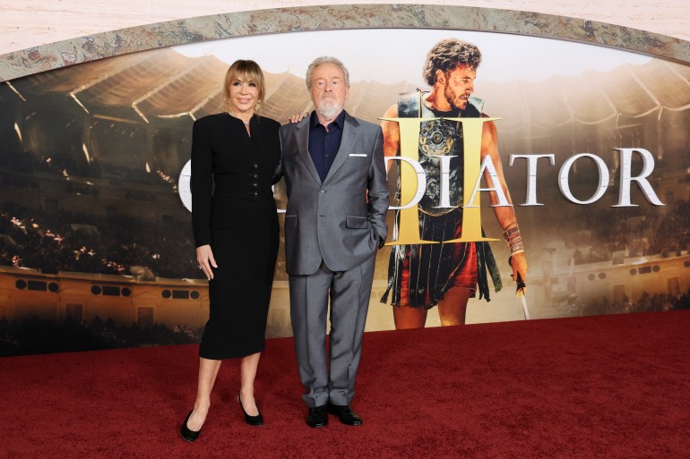 d8a4-1732016737 Director Ridley Scott and his wife Giannina Facio attend a premiere for the film 'Gladiator II', at TCL Chinese Theatre in Los Angeles, California, U.S., November 18, 2024. REUTERS/Mario Anzuoni