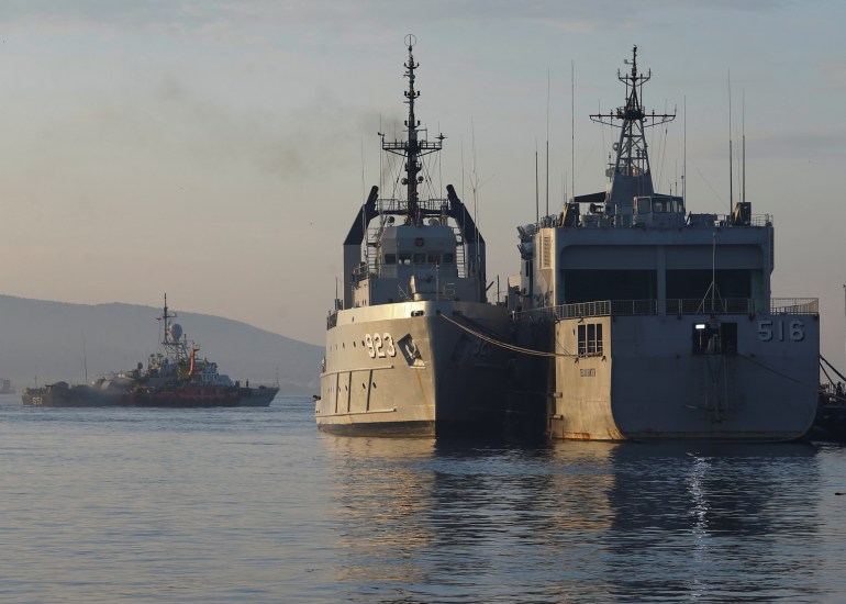 d8a8d98a-2-1730705849 Indonesian Navy's ships are seen at the Tanjung Wangi port as the search continues for the missing KRI Nanggala-402 submarine in Banyuwangi, East Java Province Indonesia, April 25, 2021. REUTERS/Ajeng Dinar Ulfiana
