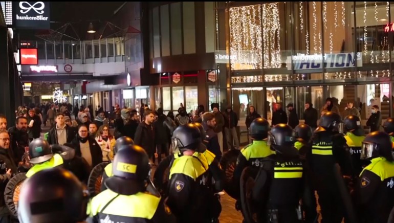 d8a8d98ad8b3-2-1731062161 In this image taken from video, police stand guard forming a line near the Ajax stadium, in Amsterdam, the Netherlands, Thursday, Nov. 7, 2024. (AP Photo InterVision)