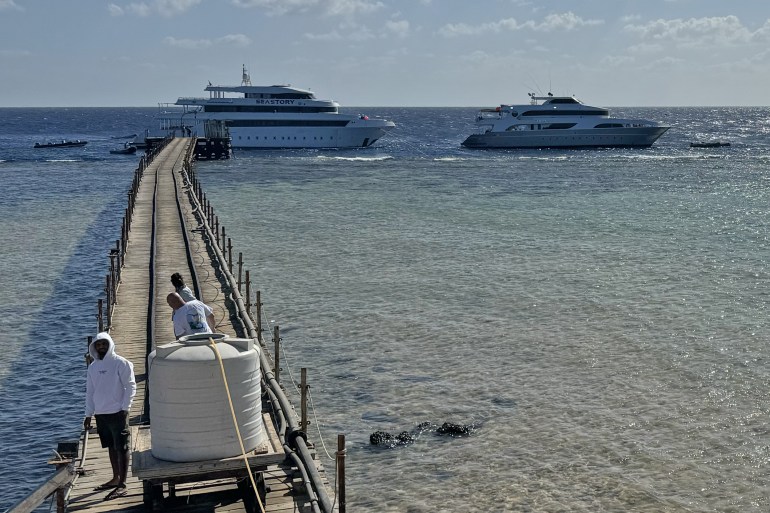 MARSA ALAM, EGYPT - (ARCHIVE) 20: A file photo dated November 20, 2024 shows an aerial view of a pier of Red Sea as yachts and boat dock in Marsa Alam, Egypt. Egyptian authorities said Monday that 28 people have been rescued after a tourist boat sank off the country's Red Sea coast. The boat was carrying 45 people, including 31 tourists and 14 crew, on a diving trip when it went down near the coastal town of Marsa Alam early Monday. Local authorities reported a distress signal from the boat at 05:30 am local time (0330 GMT) during its diving trip. (Photo by Sebnem Coskun/Anadolu via Getty Images)