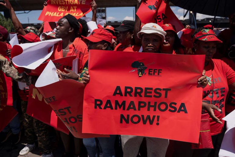 Members of the Economic Freedom Fighters (EFF) protest in the streets as they make their way to the Constitutional Court, where the political party is challenging the National Assembly’s rejection of a report that could have led to impeachment proceedings against President Cyril Ramaphosa due to the Phala Phala scandal at his private game farm in Johannesburg, South Africa, November 26, 2024. REUTERS