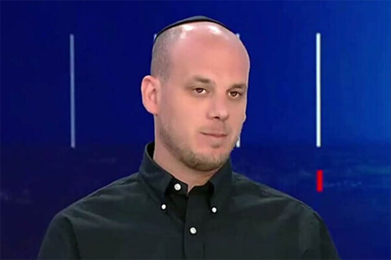 Spokesman Eli Feldstein is seen at an event with Prime Minister Benjamin Netanyahu during the Israel-Hamas war (IDF)