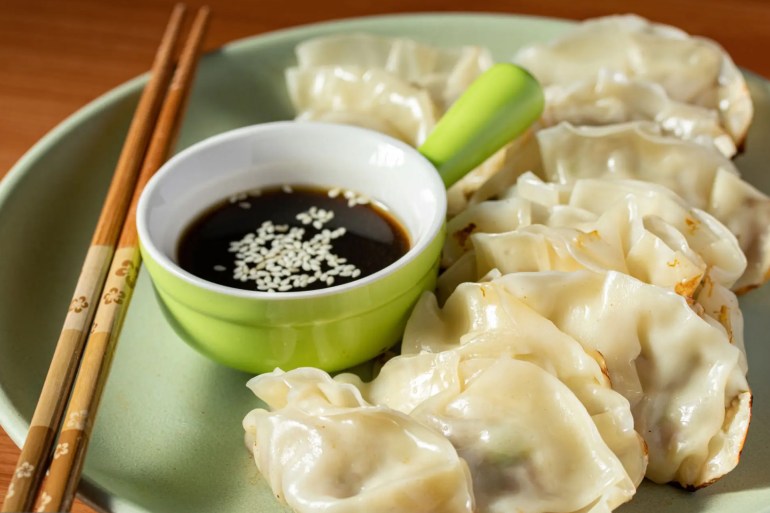 54d98a6d98a44-1734888103 Gyoza (Japanese Fried Dumplings) pork stuffing with soy sauce