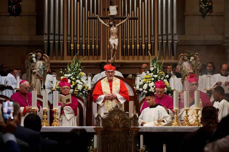 christmas-bethlehem3-1735052185 The Latin Patriarch of Jerusalem, Pierbattista Pizzaballa, leads a mass at the Church of Nativity in the Old City of Bethlehem, in the Israeli-occupied West Bank, December 24, 2024. REUTERS/Mohammed Torokman