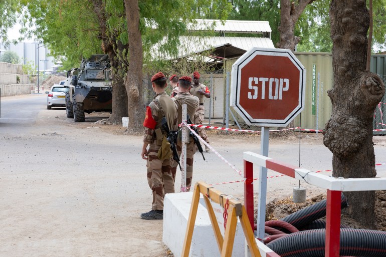 d8a7d984d981d8b1d986d8b3d98a-d9a3d8b3d8b5d8ab3-1733844096 French soldiers guard the entrance to the Base Aerienne Projetee, also called air base 172 Chief Sergeant Adji Kossei, in N'Djamena on May 14, 2024. (Photo by Joris Bolomey / AFP)