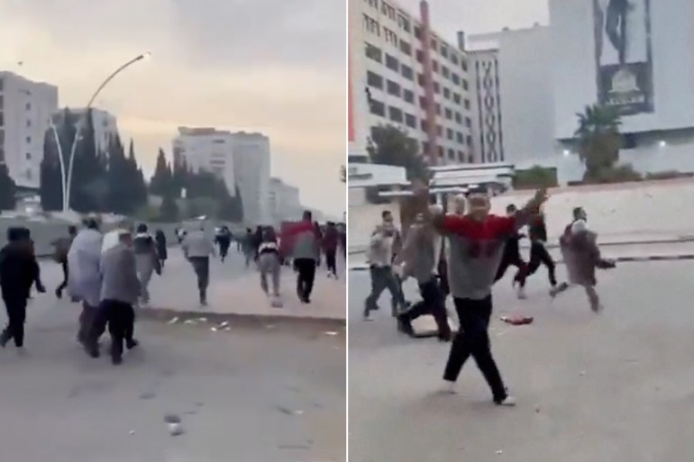 d8b4d8b5d8abd982d981d8bad8b9d986-1733699626 A person gestures as individuals, reportedly freed prisoners, run in the streets of Damascus, Syria, December 8, 2024, in this picture obtained from social media video. Nedal Al-Amari/via REUTERS THIS IMAGE HAS BEEN SUPPLIED BY A THIRD PARTY. MANDATORY CREDIT. NO RESALES. NO ARCHIVES.