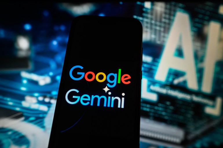 gettyimages-2100329074-1717491858 POLAND - 2024/03/23: In this photo illustration a Google Gemini logo is displayed on a smartphone with Artificial Intelligence symbol on the background. (Photo Illustration by Omar Marques/SOPA Images/LightRocket via Getty Images)