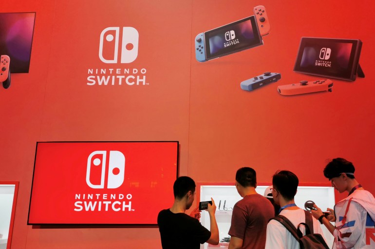 rtx71wi8 Visitors are seen at a booth of Nintendo Switch at the China Digital Entertainment Expo and Conference, also known as ChinaJoy, in Shanghai