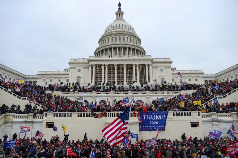 23409085 Trump supporters storm Capitol building in Washington