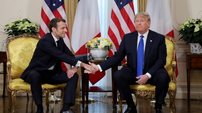 49175b2b-7de5-43a9-90ab-a457406ed750 U.S. President Donald Trump shakes hands with France's President Emmanuel Macron, ahead of the NATO summit in Watford, in London, Britain, December 3, 2019. Ludovic Marin/Pool via REUTERS