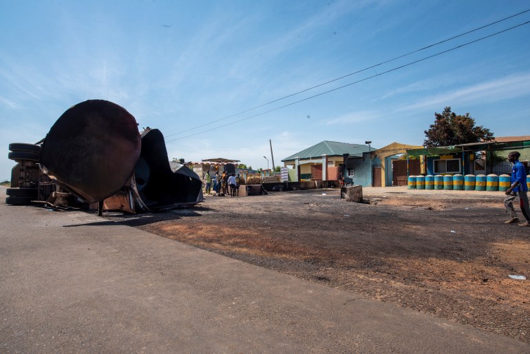 ap24290580095499-1737230983 People gather at the scene of a fuel tanker explosion in Majiya town, Nigeria, Wednesday, Oct. 16, 2024. (AP Photo/Sani Maikatanga)