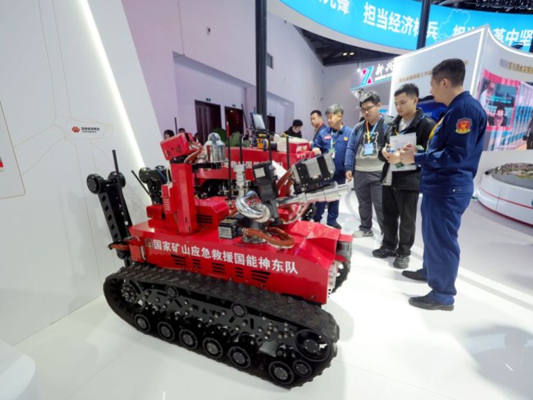 gettyimages-2183989929-1738061528 Visitors visit a ''Coal mine fire fighting robot'' at the 2024 China International Emergency Management Exhibition in Beijing, China, on November 13, 2024. (Photo by Costfoto/NurPhoto via Getty Images)
