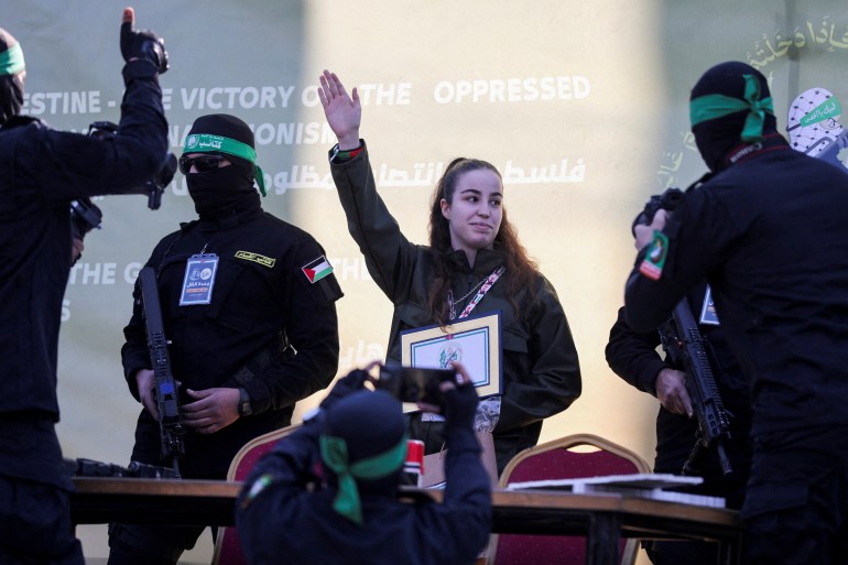 hams22-1738225751 Palestinian Hamas militants release female Israeli soldier Agam Berger held in Gaza since the deadly October 7 2023 attack, as part of a ceasefire and a hostages-prisoners swap deal between Hamas and Israel, in Jabalia, in the northern Gaza Strip, January 30, 2025. REUTERS/Dawoud Abu Alkas TPX IMAGES OF THE DAY