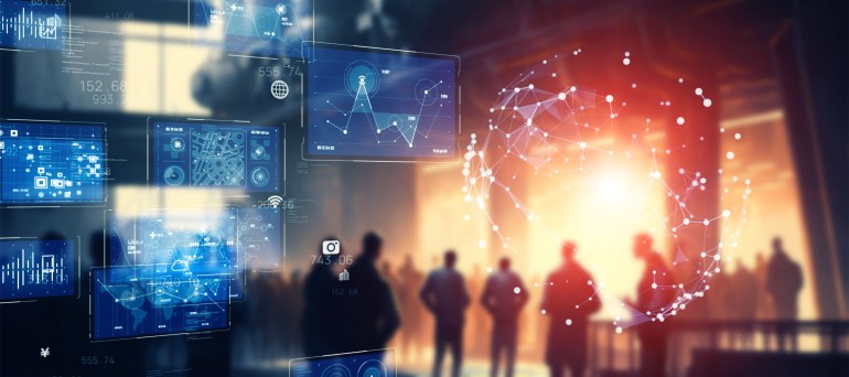 shutterstock_2256060579-1718176215 Group of people in the office and digital data concept. Wide angle visual for banners or advertisements.