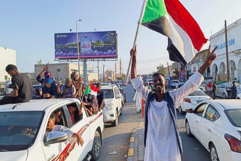 sudan-1-1736694168 Sudanese citizens celebrate following an announcement by the army that it took over the city of Wad Madani, in Port Sudan, Sudan January 11, 2025. REUTERS/Ibrahim M