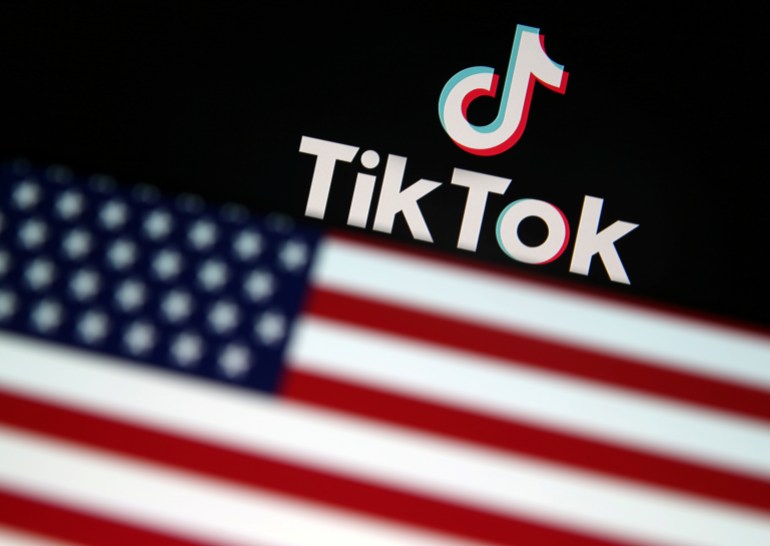 tik-tok98-1737395969 A U.S. flag is displayed in front of Tik Tok logo in this illustration picture taken August 9, 2020. REUTERS/Dado Ruvic/Illustration