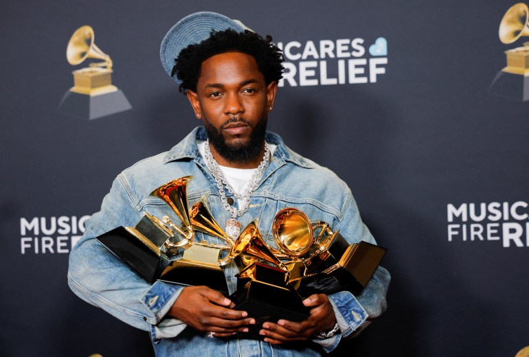 d8a8d9825-2-1738565643 Kendrick Lamar, winner of the Record Of The Year, Best Rap Performance, Best Rap Song, Best Music Video, and Song Of The Year awards, poses in the press room during the 67th Annual Grammy Awards in Los Angeles, California, U.S., February 2, 2025. REUTERS/Mike Blake TPX IMAGES OF THE DAY