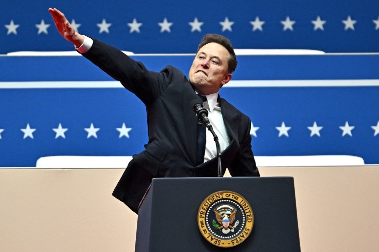 d985d8a7d8b3d983-1737632603 Tesla and SpaceX CEO Elon Musk gestures as he speaks during the inaugural parade inside Capitol One Arena, in Washington, DC, on January 20, 2025. (Photo by ANGELA WEISS / AFP)