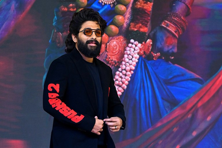 Indian actor Allu Arjun poses for photos as he attends a promotional event of his upcoming Indian film 'Pushpa 2: The Rule' in Mumbai on November 29, 2024. (Photo by SUJIT JAISWAL / AFP)