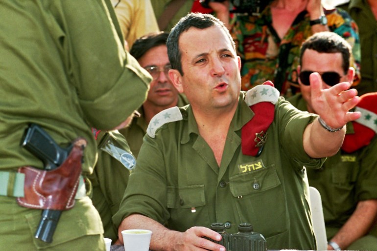 Israel Army Chief of Staff Lt. General Ehud Barak shown in a file photo dated 28 September 1993 conferring with his officers during a visit to the West Bank town of Jericho. Barak is now Israel's Labor party leader. (Photo by PATRICK BAZ / AFP FILES / AFP)