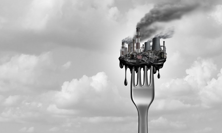 shutterstock_1703392240-1737744341 Pollution and food and toxic pollutants in nutrition as eating a contaminated meal as a fork with industrial toxins or climate change affects on the body with 3D illustration elements.