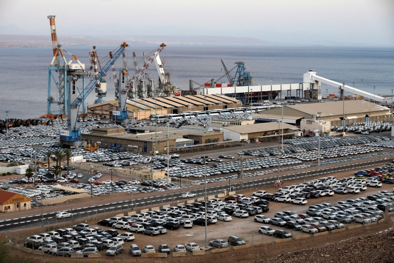FILE PHOTO: New imported cars are seen in a parking lot next to the Eilat port, Israel, June 12, 2018. Picture taken June 12, 2018. REUTERS/Amir Cohen/File Photo