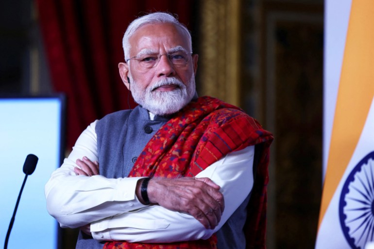 The government of Indian Prime Minister Narendra Modi, seen here at a summit in Paris on February 11, 2025, is pushing a law that would give it greater control over Muslim endowments [Abdul Saboor/ AP]