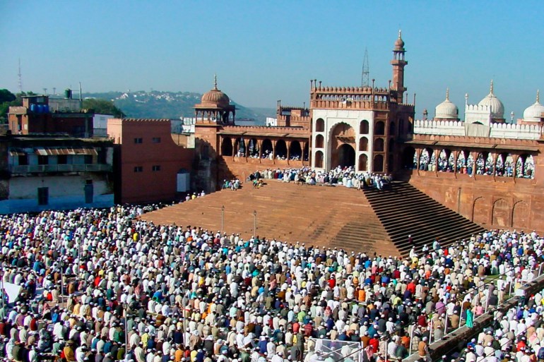 Indian Muslims offer prayers at Moti Mosque in the city of Bhopal on February 2, 2004. In official records, the mosque’s land is shown as government-owned, which community activists saw as an absurd example of the mismanagement that has allowed the illegal takeover of waqf land [File: Raj Patidar SC/Reuters]