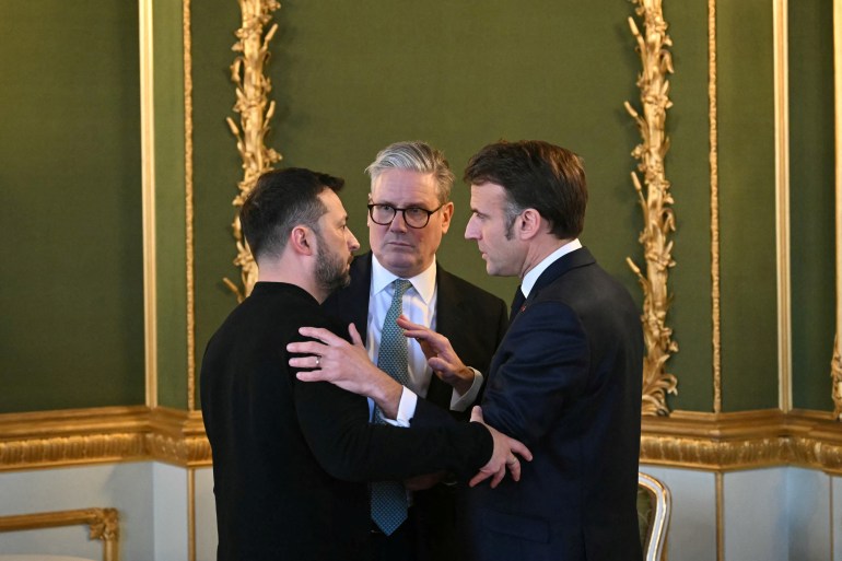 British Prime Minister Keir Starmer hugs Ukrainian President Volodymyr Zelenskiy as he arrives for a summit on Ukraine at Lancaster House in London, Britain, March 2, 2025. Christophe Ena/Pool via REUTERS TPX IMAGES OF THE DAY