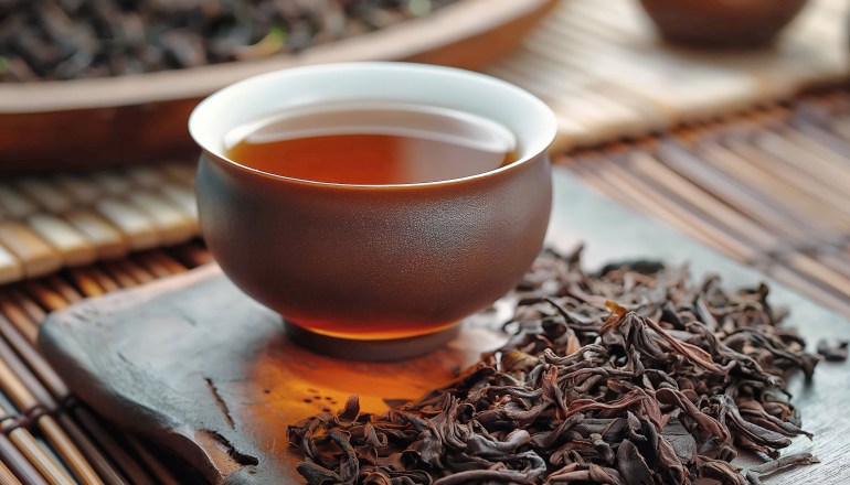 adobestock_1191615272-1742585811 https://s.mj.run/eCoXd3cJmOA , In the midst of a tranquil tea generation, a perfect cup of Pu'er tea awaits, its dark brown liquid nestled among a bed of loose tea leaves. These leaves, dark brown and appearing dry, exude the essence of their heritage. The vessel holding this exquisite brew is a white ceramic cup, its rounded body cradling the tea with elegance, while a small handle offers a touch of practicality. The lighting is natural and soft, illuminating the scene evenly and adding a warm, soft tone to the image, extremely sharp focus in details, HASSELBLAD XCD 30mm at f5.0, --ar 7:4 --stylize 550 Job ID: 7063b259-1f56-4d9d-953c-412877ee25bf المصدر : أدوبي ستوك