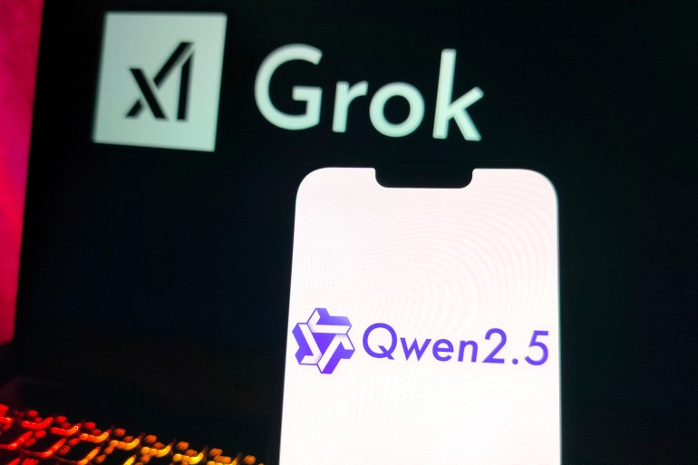 Delhi, India- 20 Feb 2025; Selective focus on smartphone screen displaying the Qwen 2.5 chatbot logo in contrast to Grok x AI, symbolizing the competition Qwen 2.5 vs Grok x AI; Shutterstock ID 2588287323; purchase_order: aljazeera ; job: ; client: ; other: