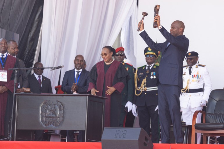 d98ad8b3d8ab-3-1737010371 Daniel Chapo (2nd R) holds up a gavel after being sworn in as the President of Mozambique during his inauguration at Independence Square in Maputo on January 15, 2025. Mozambique swore in Daniel Chapo as president on January 15, 2025 following months of post-election violence that an NGO says has killed more than 300 people.