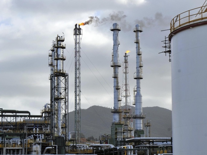 e67a7486-dd93-47f0-acd7-8e99d5453a52 This Jan. 26, 2014 photo shows the Skikda oil refinery, 350 kilometers east of Algiers, Algeria. With oil prices at their lowest in five years, North Africa’s hydrocarbon giant Algeria is feeling the pinch and may have to re-examine generous and massive public spending to confront social unrest. (AP Photo/Anis Belghoul)
