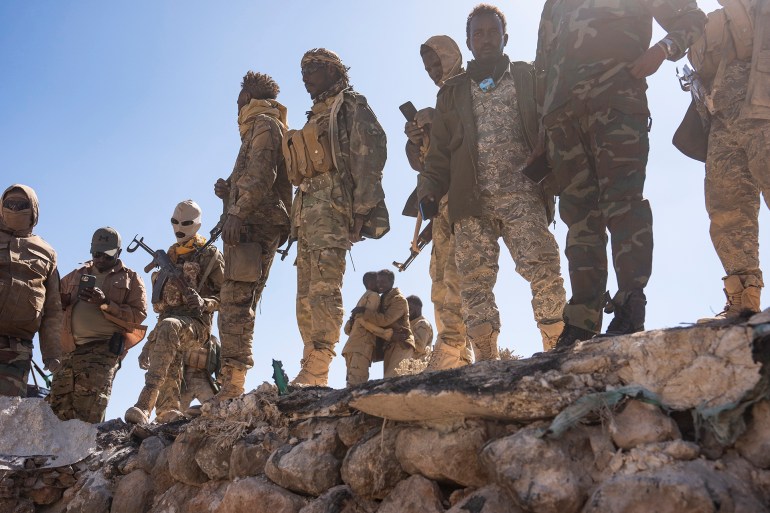 gettyimages-2198085020-1741527793 DAABDAMALE, PUNTLAND, SOMALIA - JANUARY 25: Soldiers with the Puntland Defense Forces spend time at a former Islamic State stronghold that they recently took back on the frontline near Daabdamale, Puntland, Somalia on January 25, 2025. Islamic State in Somalia recruits foreign fighters and brings them into Somalia to try to gain ground in what is becoming a key nerve center for the Islamic State. (Photo by Carolyn Van Houten/The Washington Post via Getty Images)