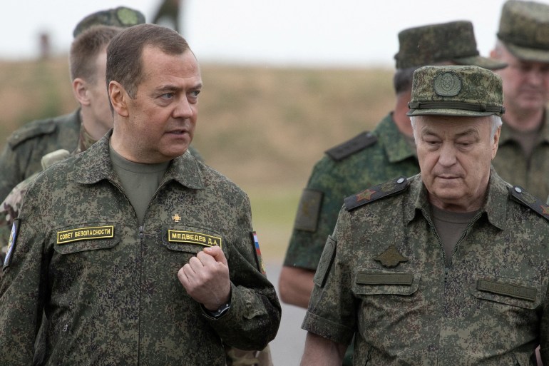 FILE PHOTO: Russia's Deputy head of the Security Council Dmitry Medvedev visits the Prudboi military training ground in Volgograd region