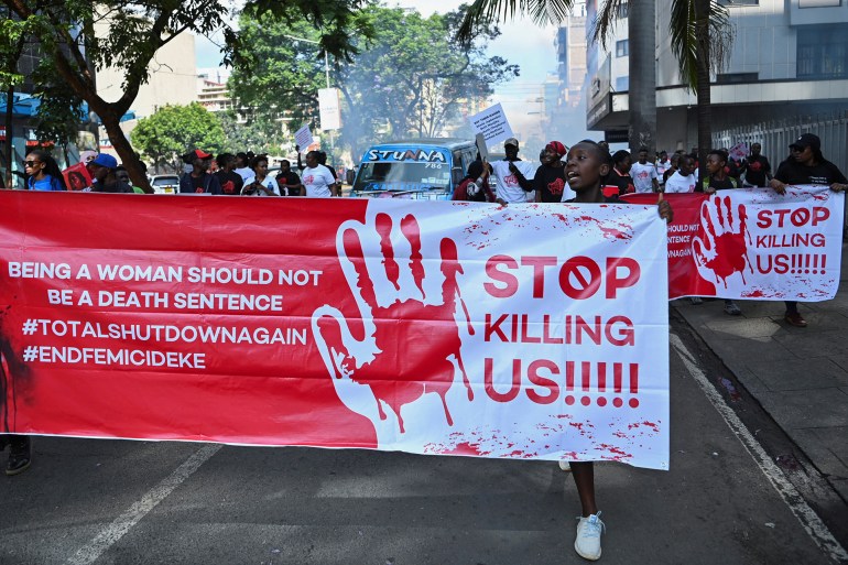 reuters-ne4-1733836216 Activists and civil society members participate in a nationwide march titled “End Femicide Kenya" to raise awareness about gender-based violence (GBV) and to pressure the Kenyan government to implement stricter laws and policies to combat this pervasive issue, in downtown Nairobi, Kenya December 10, 2024. REUTERS/John Muchucha