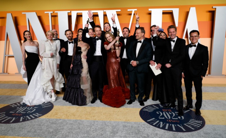 The team from "I'm Not a Robot" pose with the Oscar for Best Live Action Short Film at the Vanity Fair Oscars party after the 97th Academy Awards, in Beverly Hills, California, U.S., March 2, 2025. REUTERS/Danny Moloshok