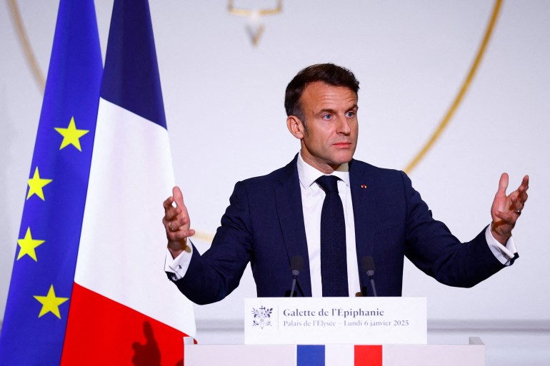 wfwef-1736279158 French President Emmanuel Macron gestures as he delivers a speech to the French Bakery and Pastry Federation members for the traditional Epiphany cake ceremony at the Elysee Palace in Paris, on January 6, 2025. (Photo by Sarah Meyssonnier / POOL / AFP)