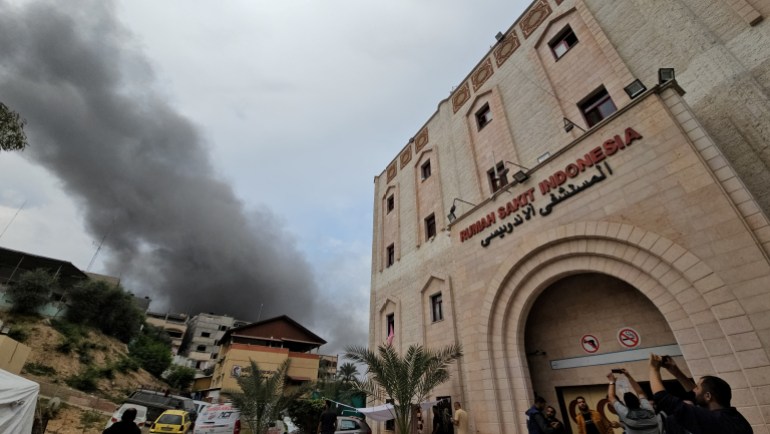 Smoke rises following an Israeli strike near the Indonesian Hospital that ran out of fuel and electricity, in the northern Gaza Strip, November 12, 2023. REUTERS/Anas al-Shareef