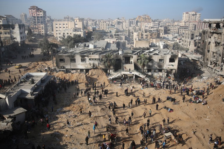 Palestinians inspect the damage at Gaza's Al-Shifa hospital after the Israeli military withdrew from the complex housing the hospital on April 1, 2024, amid the ongoing battles Israel and the Hamas militant group. (Photo by AFP)