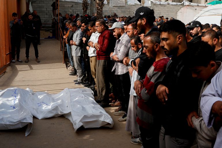 2ns-gaza-1745579972 Mourners pray next to the bodies of Palestinians killed in Israeli strikes, at Nasser hospital, in Khan Younis, in the southern Gaza Strip, April 7, 2025. REUTERS/Hatem Khaled