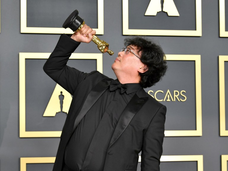 58cc0c58-d3cc-4234-a59a-1f6213a531e0 HOLLYWOOD, CALIFORNIA - FEBRUARY 09: Director Bong Joon-ho, winner of the Original Screenplay, International Feature Film, Directing, and Best Picture award for Parasite, poses in the press room during the 92nd Annual Academy Awards at Hollywood and Highland on February 09, 2020 in Hollywood, California. Amy Sussman/Getty Images/AFP== FOR NEWSPAPERS, INTERNET, TELCOS & TELEVISION USE ONLY ==