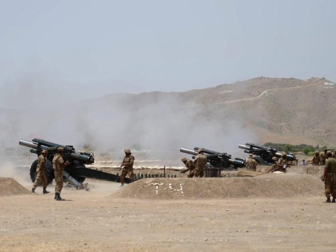 a4cf7183-5be8-4860-8ac9-e438724daf6f A handout picture released by the Pakistan Armed Forces Inter-Services Public Relations (ISPR) made available on 03 July 2014 shows Pakistani soldiers using weaponry during a military operation against Taliban militants in the town of Miranshah in North Waziristan. Pakistan's military boosted their ground operations against militant strongholds 30 June after more than two weeks of aerial bombardment and civilian evacuations, an official said. Troops moved into Miranshah in the tribal district of North Waziristan for house-to-house searches, army spokesman Major General Asim Saleem Bjawa said. Over 370 militants are estimated to have been killed and 19 have surrendered since the June 15 start of the operation, dubbed Zarb-e-Azb after a sword wielded by Prophet Mohammed. At least 61 militant hideouts have been destroyed, the spokesman said.