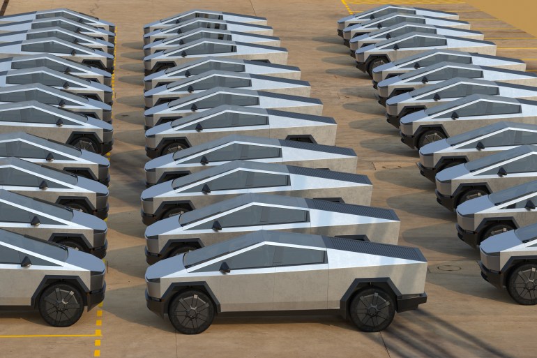 adoonly-1744373281 Tesla Cybertruck-rows of new cars in port