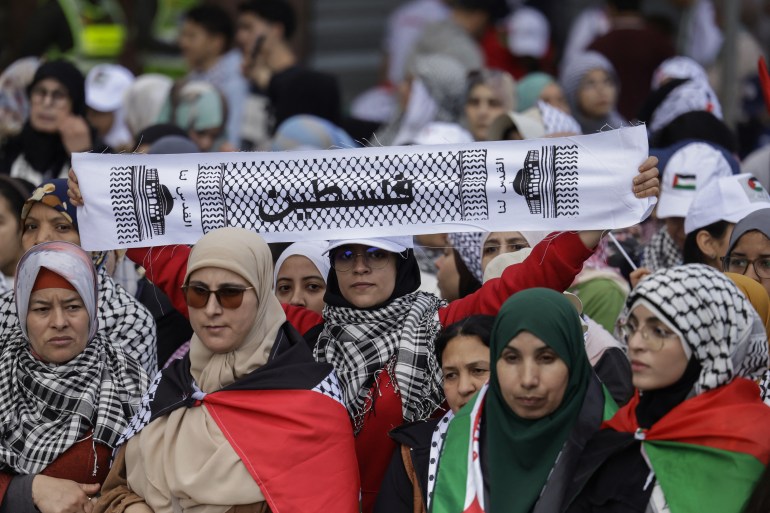 afp_67fbd57c217f-1744557436 Women take part in a national march in support of Palestinians and against Morocco's normalisation of ties with Israel, in the capital Rabat on April 6, 2025. (Photo by Abdel Majid BZIOUAT / AFP)