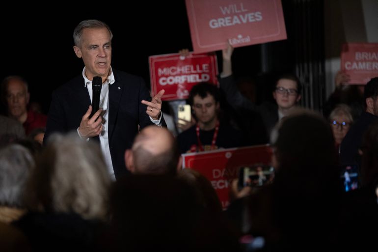 Canadian Prime Minister and Liberal leader Mark Carney speaks to supporters at his last rally of the Canadian election while at Sea Cider Farm in Saanichton, British Columbia on April 27, 2025. (Photo by CHAD HIPOLITO / AFP)