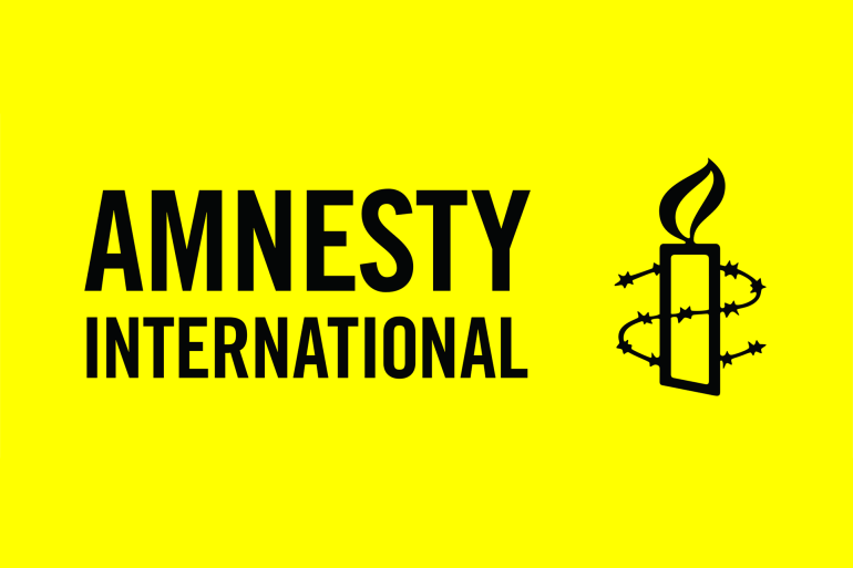 amnesty_international شعار منظمة العفو الدولية
