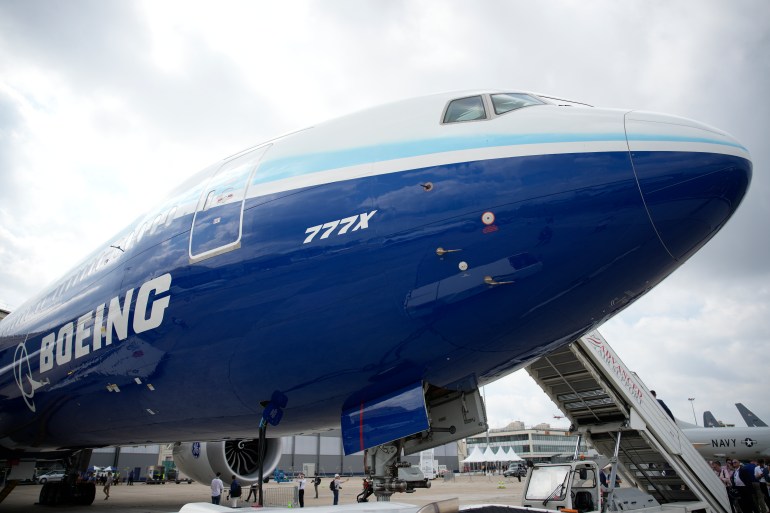 ap24213512527134-1737905023 FILE - The Boeing 777X airplane is shown during the Paris Air Show in Le Bourget, north of Paris, France, June 19, 2023. Boeing said Wednesday, July 31, 2024, that aerospace industry veteran Robert "Kelly" Ortberg will take over as CEO next week, replacing David Calhoun. Boeing is announcing the new CEO as it reports a loss of more than $1.4 billion in the second quarter. (AP Photo/Lewis Joly, File)
