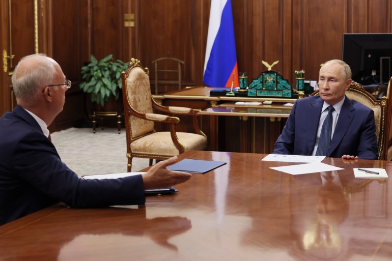 ap_67ef207b2086b-1743724667 Russian President Vladimir Putin, right, speaks with the CEO of the Russian Direct Investment Fund Kirill Dmitriev during their meeting at the Kremlin in Moscow, Russia, Monday, Jan. 13, 2025. (Alexander Kazakov, Sputnik, Kremlin Pool Photo via AP)
